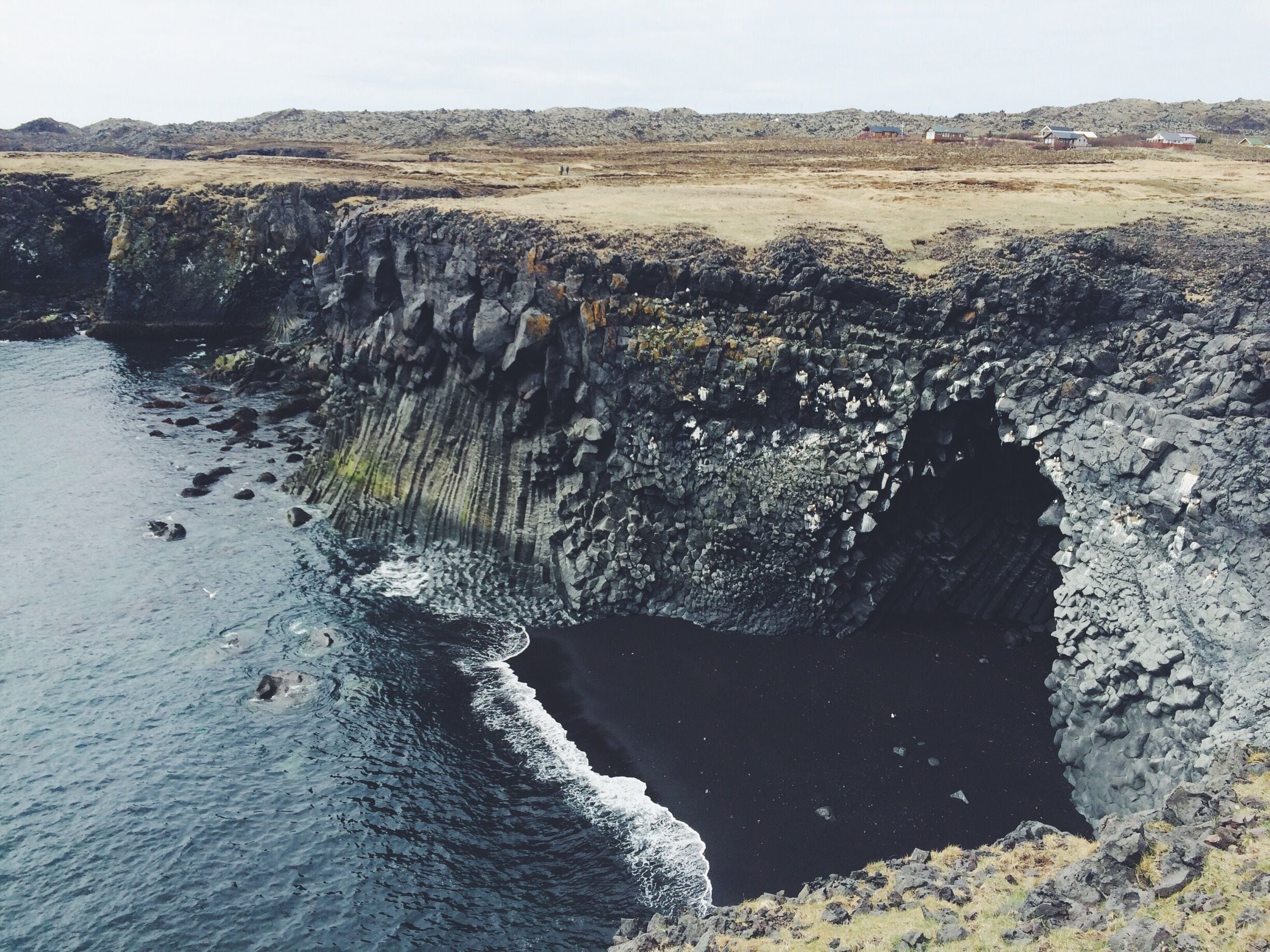 Black sand beaches and cliffs at Arnarstapi. 