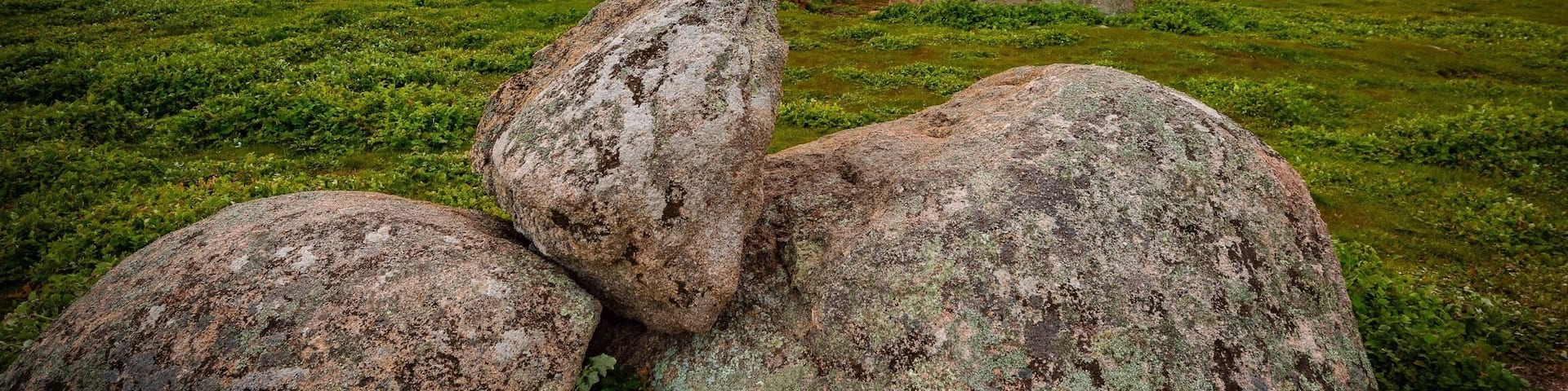 Dog Rocks near Batesford in Victoria is a formation of weather worn rocks protruding out of the ground at the top of a hill. Dog Rocks offers photographers with wonderful sunrise and sunset photography. #GreatOutdoors