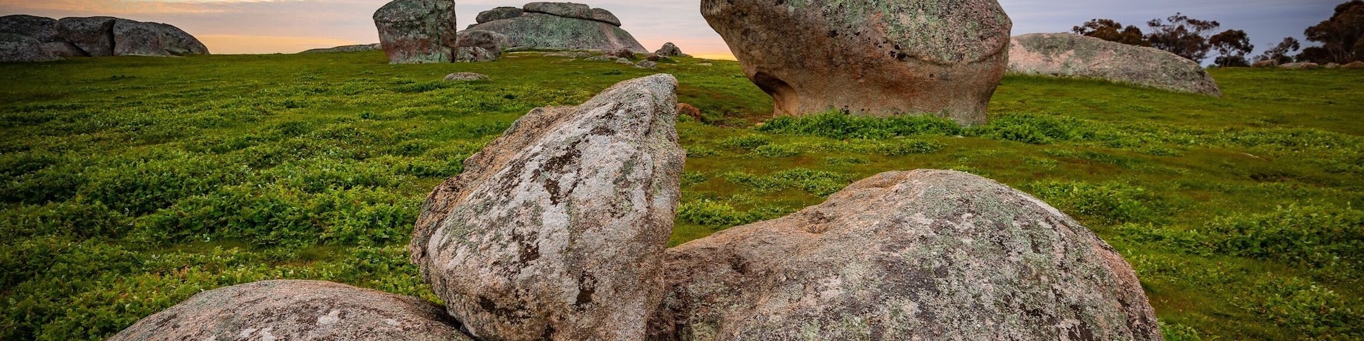Dog Rocks near Batesford in Victoria is a formation of weather worn rocks protruding out of the ground at the top of a hill.  Dog Rocks offers photographers with wonderful sunrise and sunset photography.  #GreatOutdoors