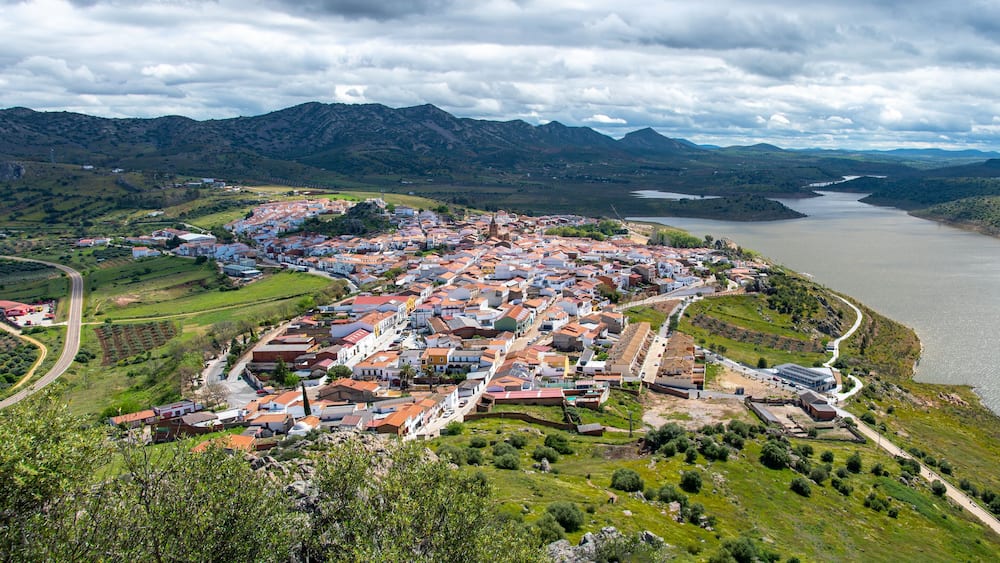 Alange wide angle panoramic picture showing the beautiful Spanish town and lake.