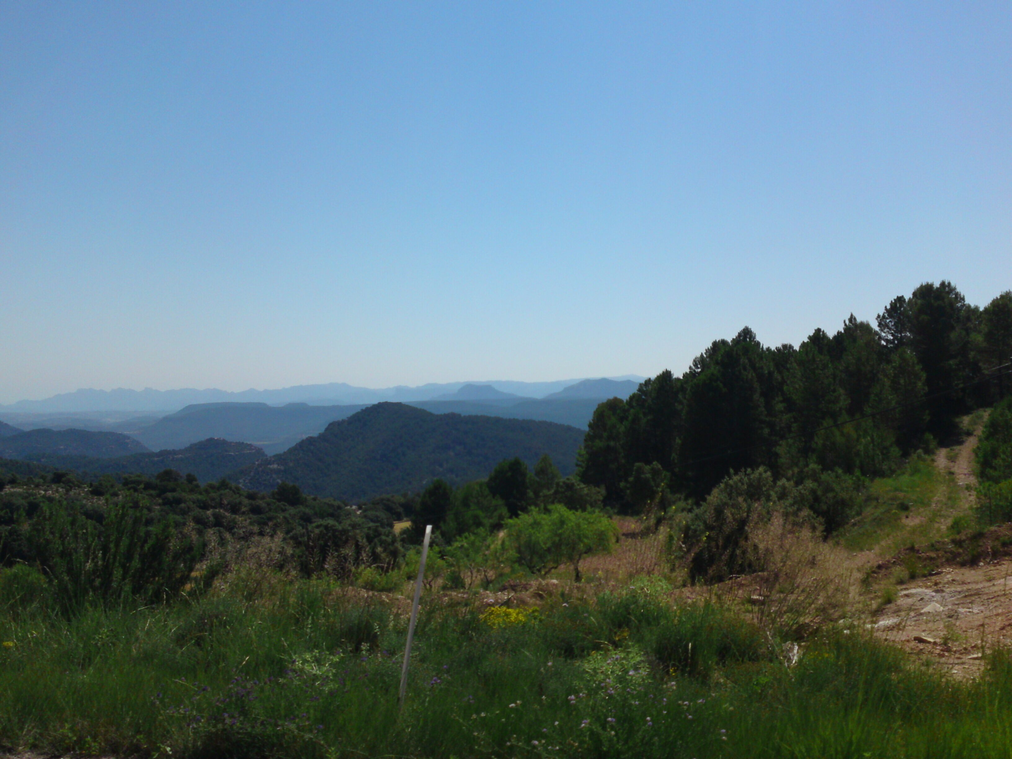 A mountainous landscape with a clear sky.