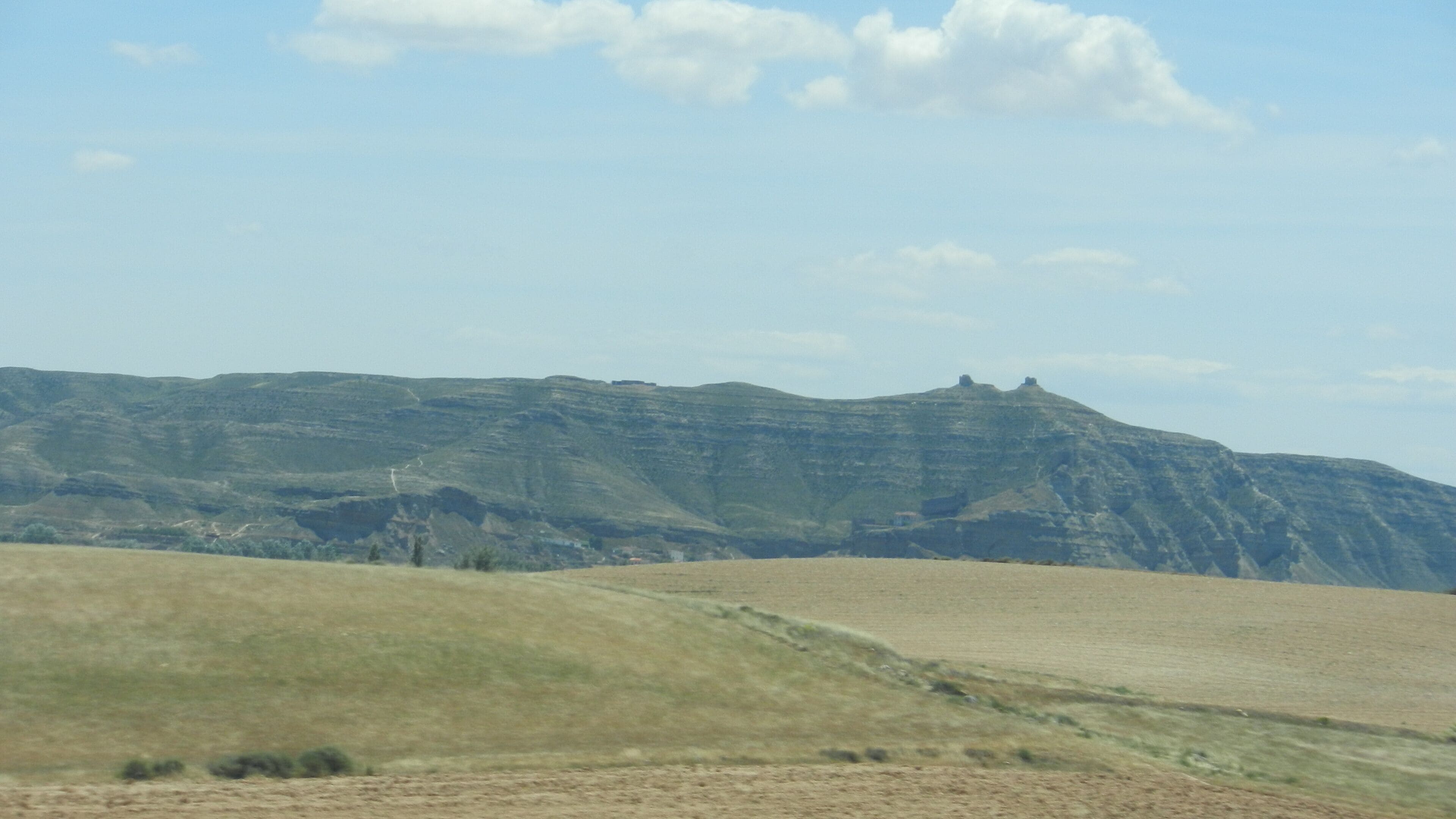 A mountainous landscape with a clear sky.
