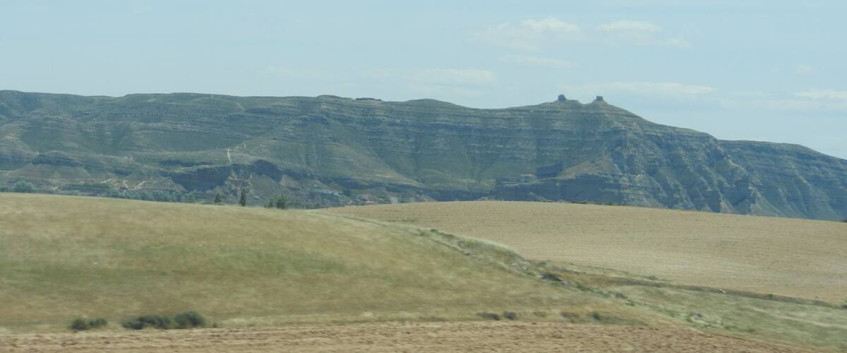 A mountainous landscape with a clear sky.