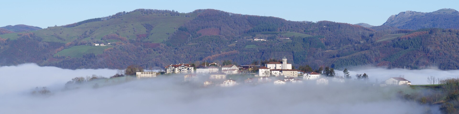 Orendain. The municipality of Orendain appears between the mists of dawn in the region of tolosaldea, province of Gipuzkoa, Basque Country.