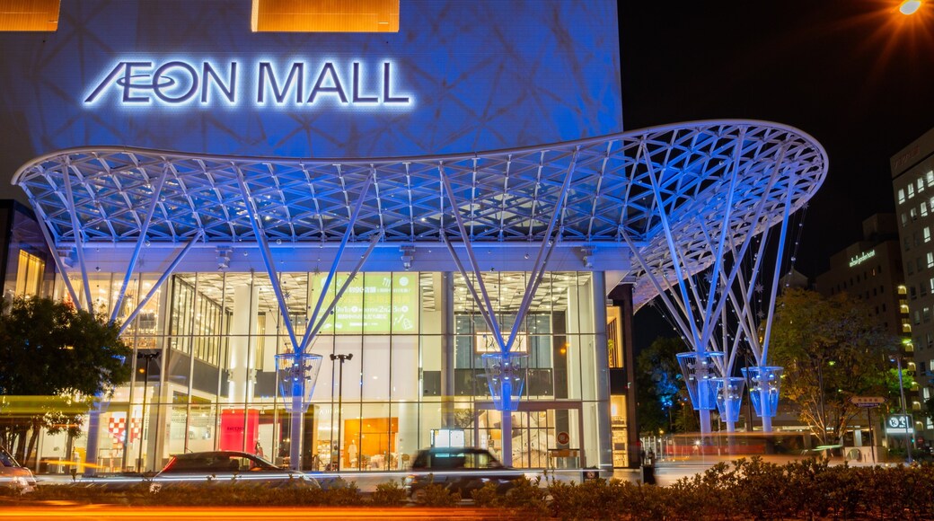 Aeon Mall Okayama featuring a city, night scenes and signage