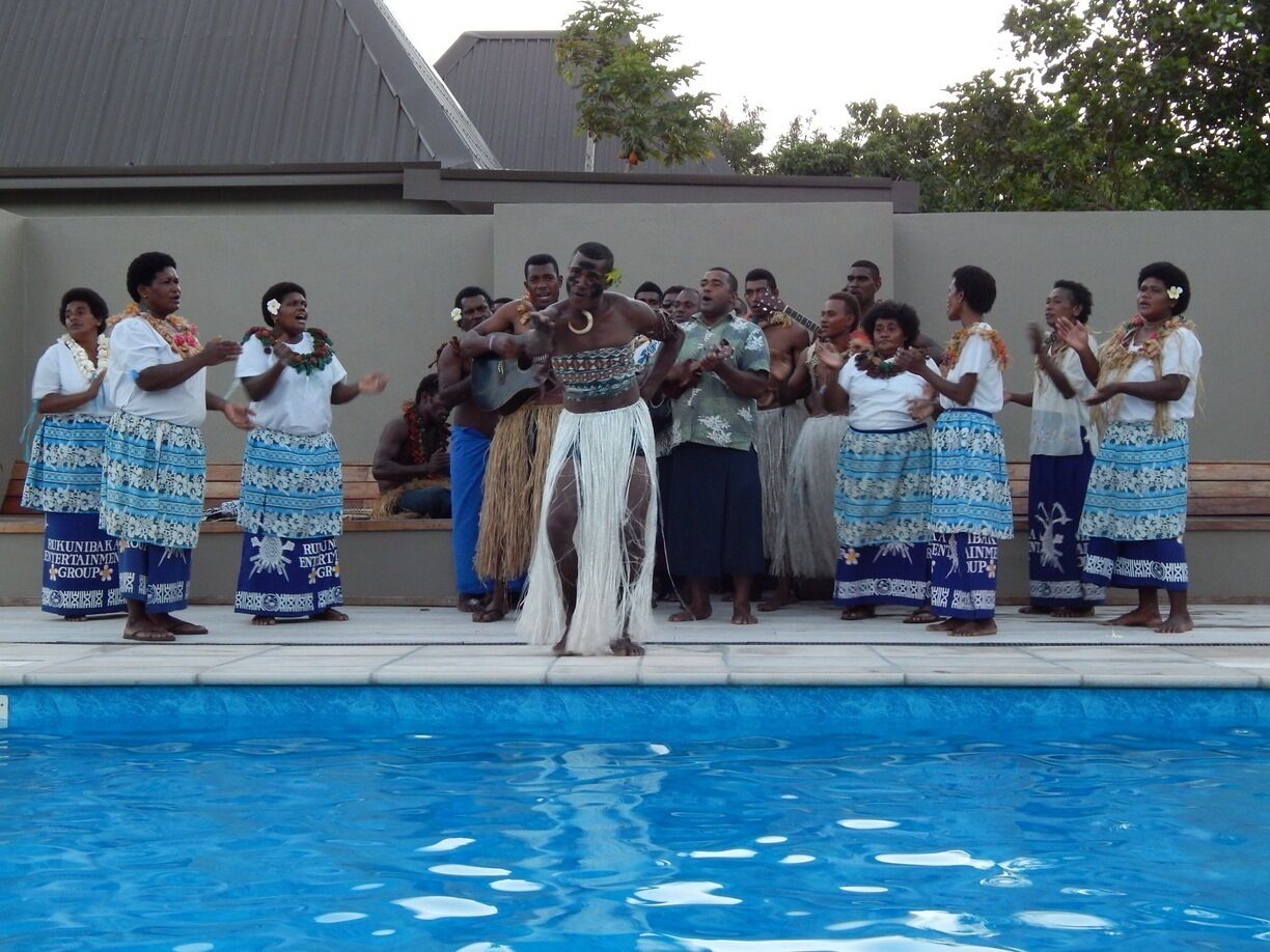 A traditional Fijian song and dance performance at the Blue Lagoon Beach Resort on Nacula Island, Fiji. 