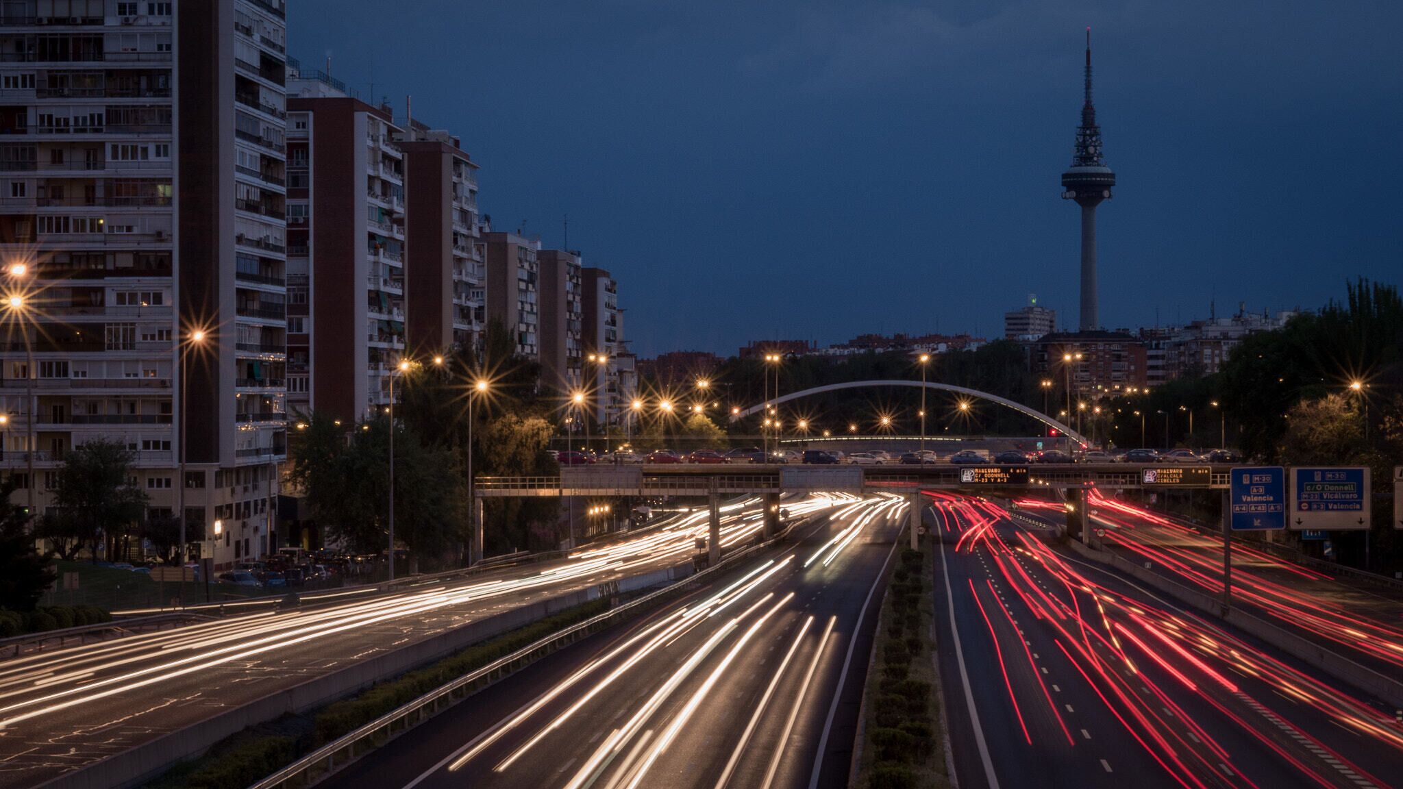 500px provided description: Rush hour in Ciudad Lineal, Madrid, Spain [#city ,#street ,#cityscape ,#traffic ,#skyscraper ,#pedestrian ,#street light ,#rush hour ,#downtown district ,#city street]