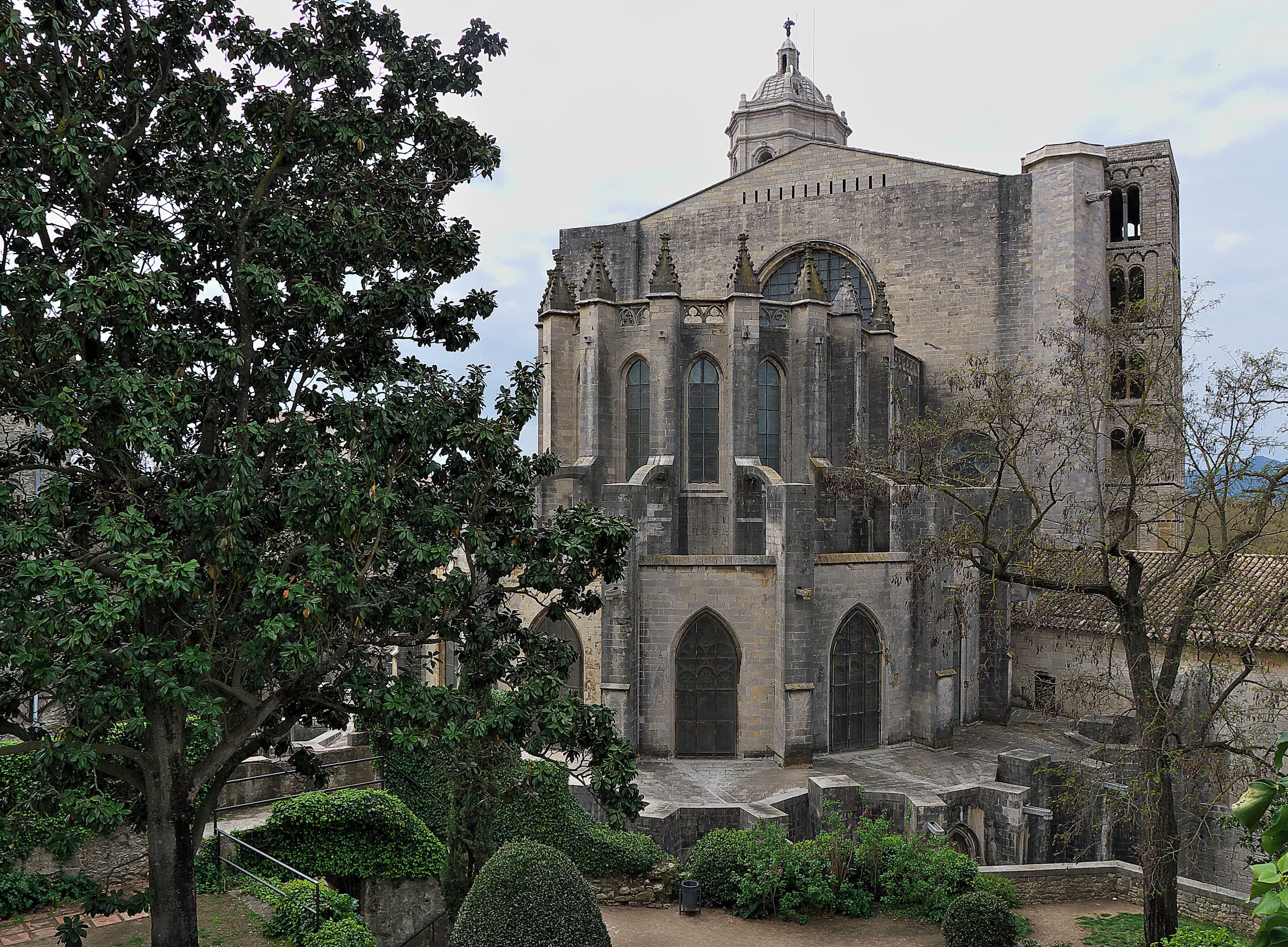 A historic church with Gothic architecture, featuring pointed arches and a large rose window.