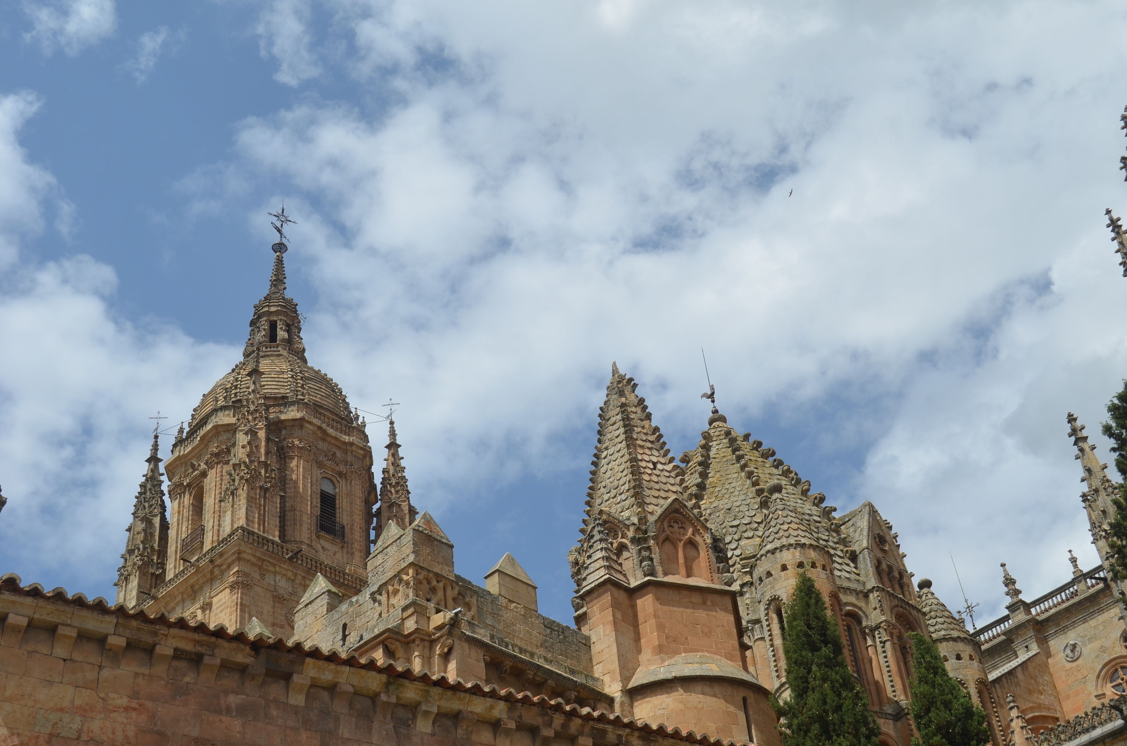 A historic church with intricate architecture and a clear sky.
