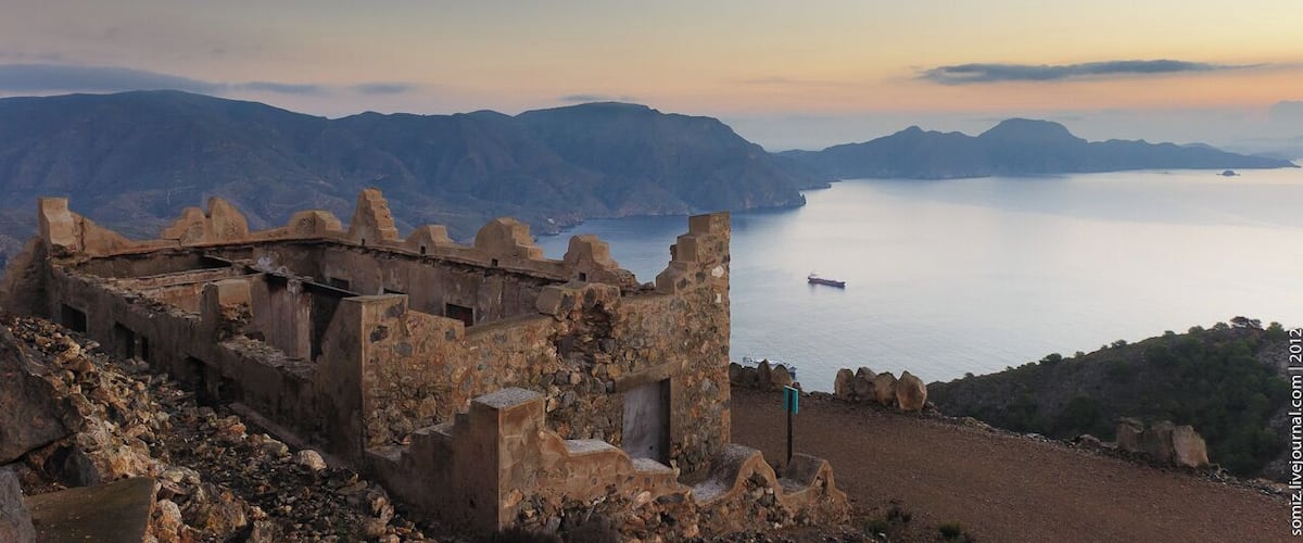 Bateria de Atalayon - one of three fortifications (Atalayon, El Jorel, Castillitos), built on a promontory Cabo Tinoso early in the last century and is used to protect the naval base in the city of Cartagena. In 1952, the guns were dismantled, and the building was given as warehouses. In the early 90's of the last century, excluded from the Ministry of Defence of Spain. Currently located in a derelict state. Open to tourists. Cabo Tinoso. Spain. Autumn 2012.