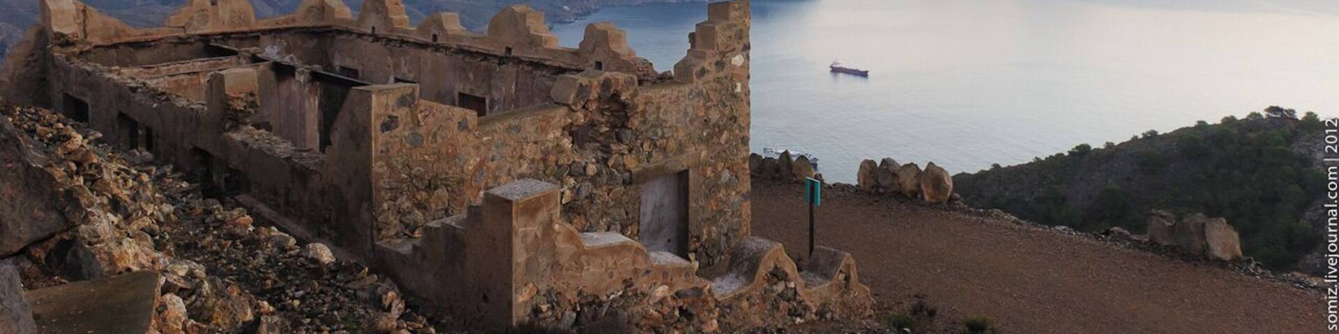 Bateria de Atalayon - one of three fortifications (Atalayon, El Jorel, Castillitos), built on a promontory Cabo Tinoso early in the last century and is used to protect the naval base in the city of Cartagena. In 1952, the guns were dismantled, and the building was given as warehouses. In the early 90's of the last century, excluded from the Ministry of Defence of Spain. Currently located in a derelict state. Open to tourists. Cabo Tinoso. Spain. Autumn 2012.