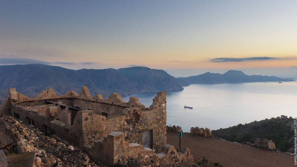 Bateria de Atalayon - one of three fortifications (Atalayon, El Jorel, Castillitos), built on a promontory Cabo Tinoso early in the last century and is used to protect the naval base in the city of Cartagena. In 1952, the guns were dismantled, and the building was given as warehouses. In the early 90's of the last century, excluded from the Ministry of Defence of Spain. Currently located in a derelict state. Open to tourists. Cabo Tinoso. Spain. Autumn 2012.