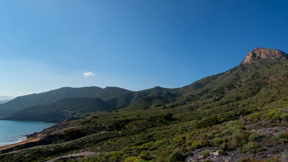 Green mountains and sandy beaches of regional park of Calblanque, Monte de las Cenizas and Peña del Aguila in Spain