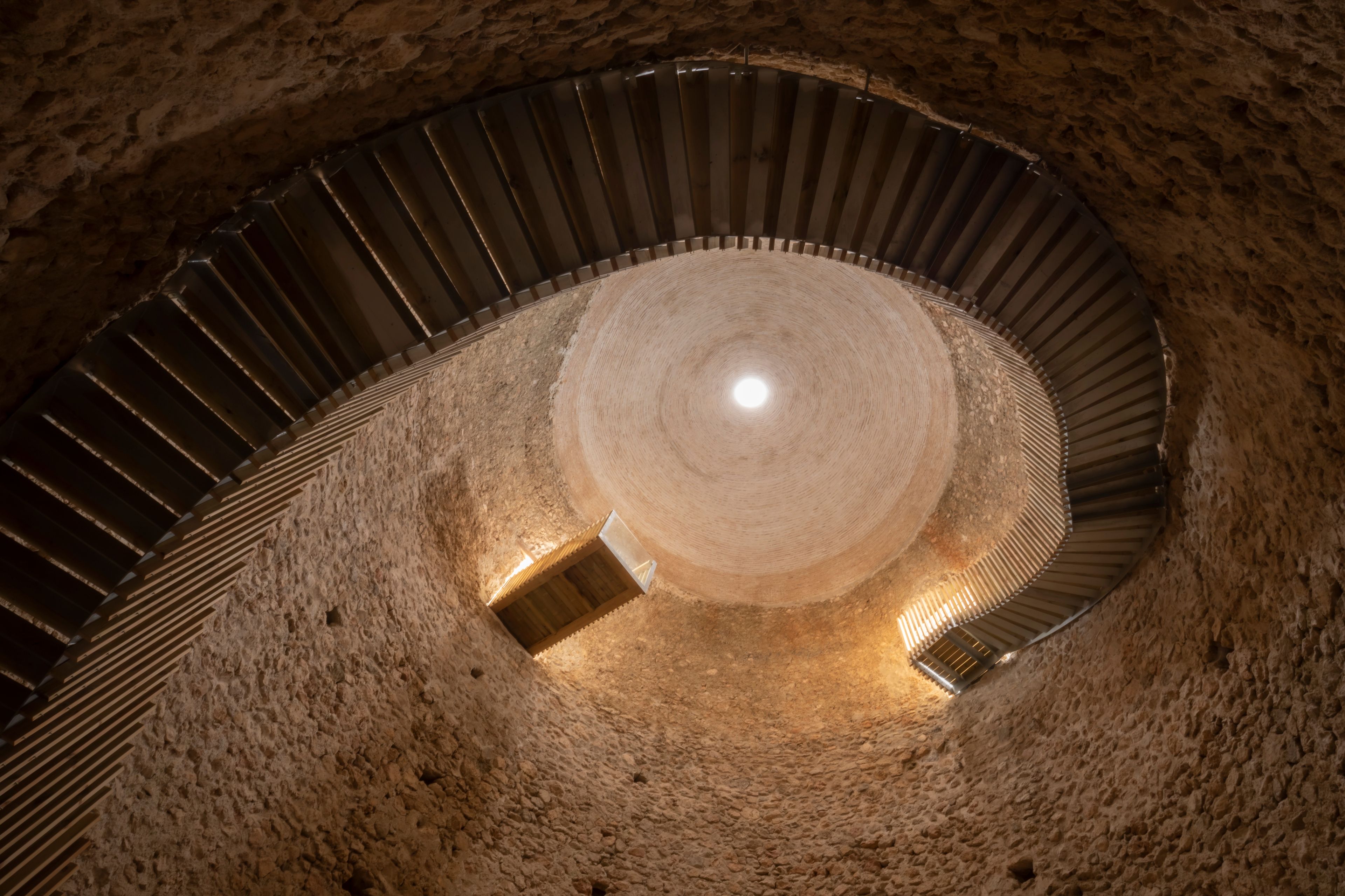 Interior of a Snow Well in Sierra Espuna, Region of Murcia, Spain. View of the medieval brick dome and the access staircase to the interior