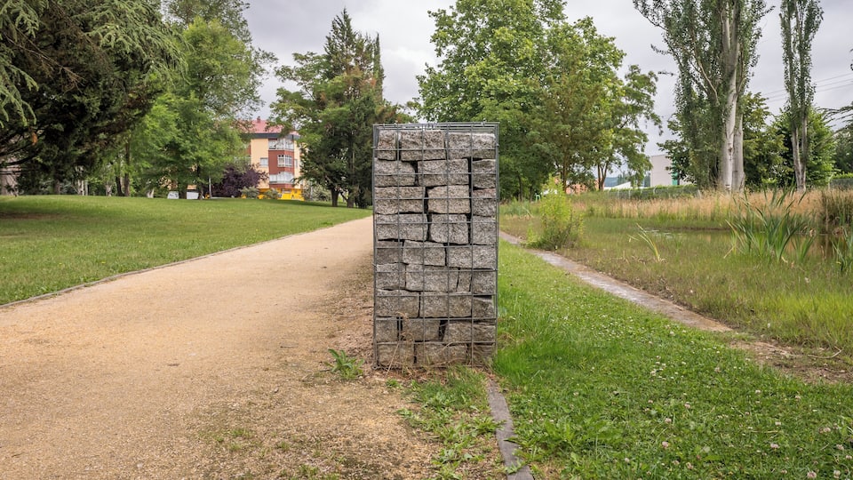 Granite gabion in the Biodiversity Park of Arriaga. Vitoria-Gasteiz, Basque Country, Spain