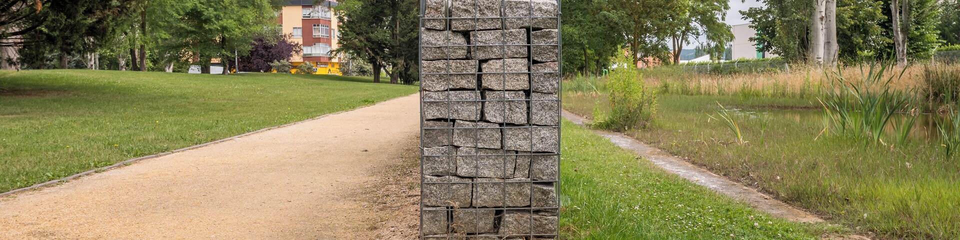 Granite gabion in the Biodiversity Park of Arriaga. Vitoria-Gasteiz, Basque Country, Spain