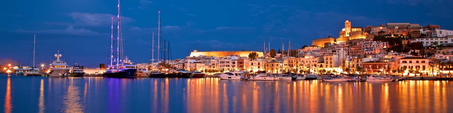 Ibiza City Centre which includes a coastal town, night scenes and a bay or harbor