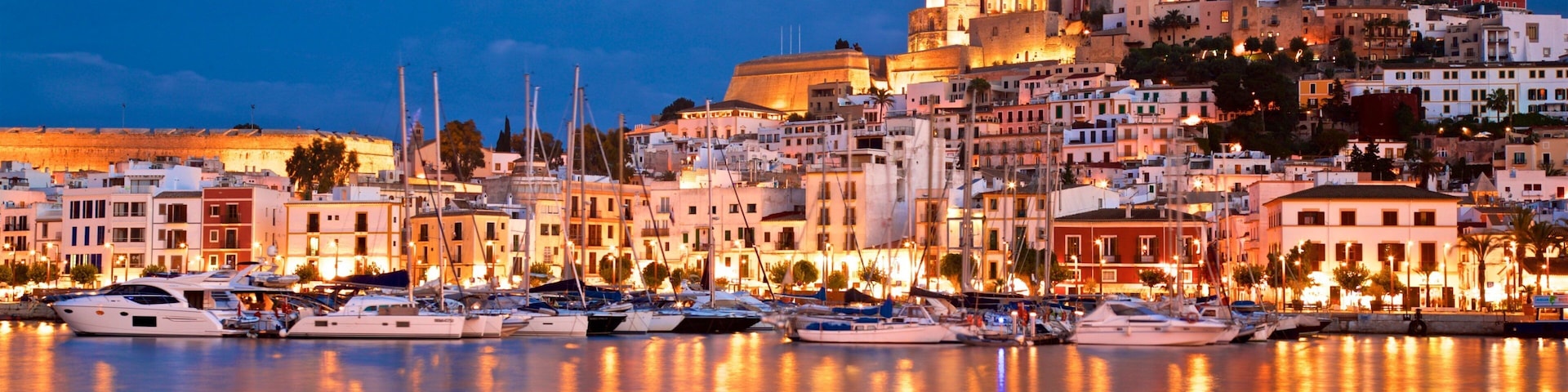 Ibiza City Centre which includes a coastal town, a bay or harbor and night scenes