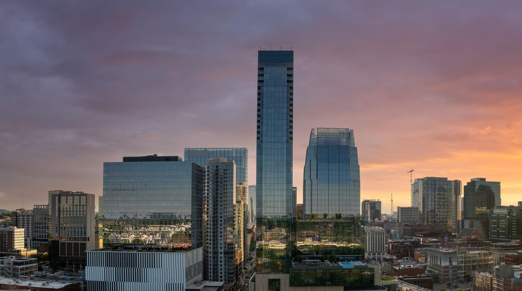 Downtown of Nashville, Tennessee with modern skyline at sunset. Vibrant urban atmosphere in American city.