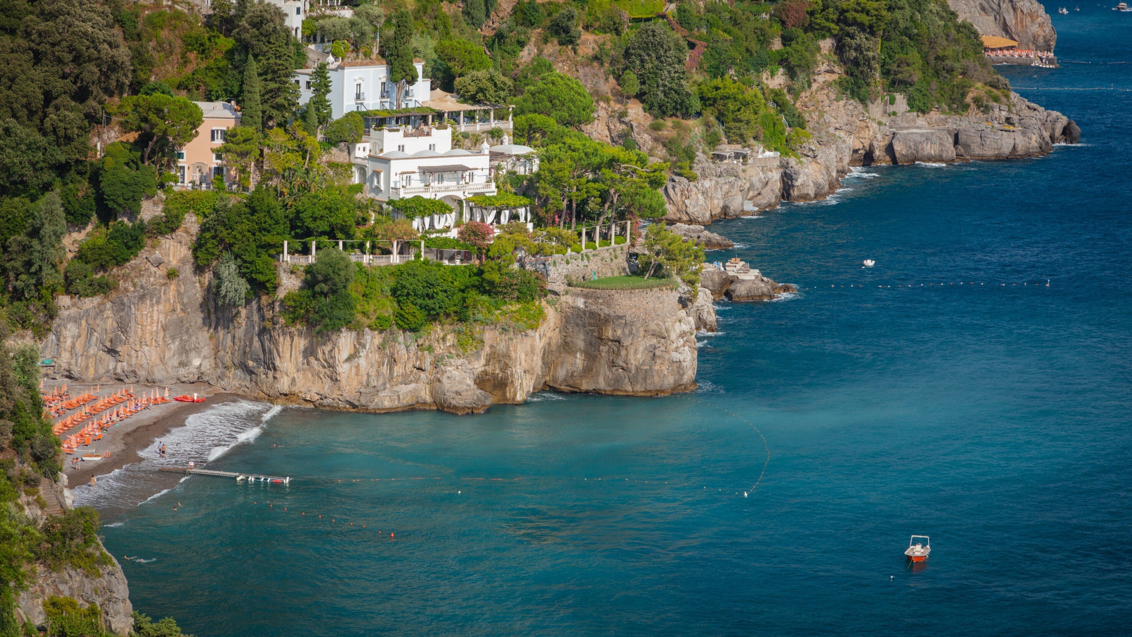 Positano City Centre featuring rocky coastline, general coastal views and landscape views
