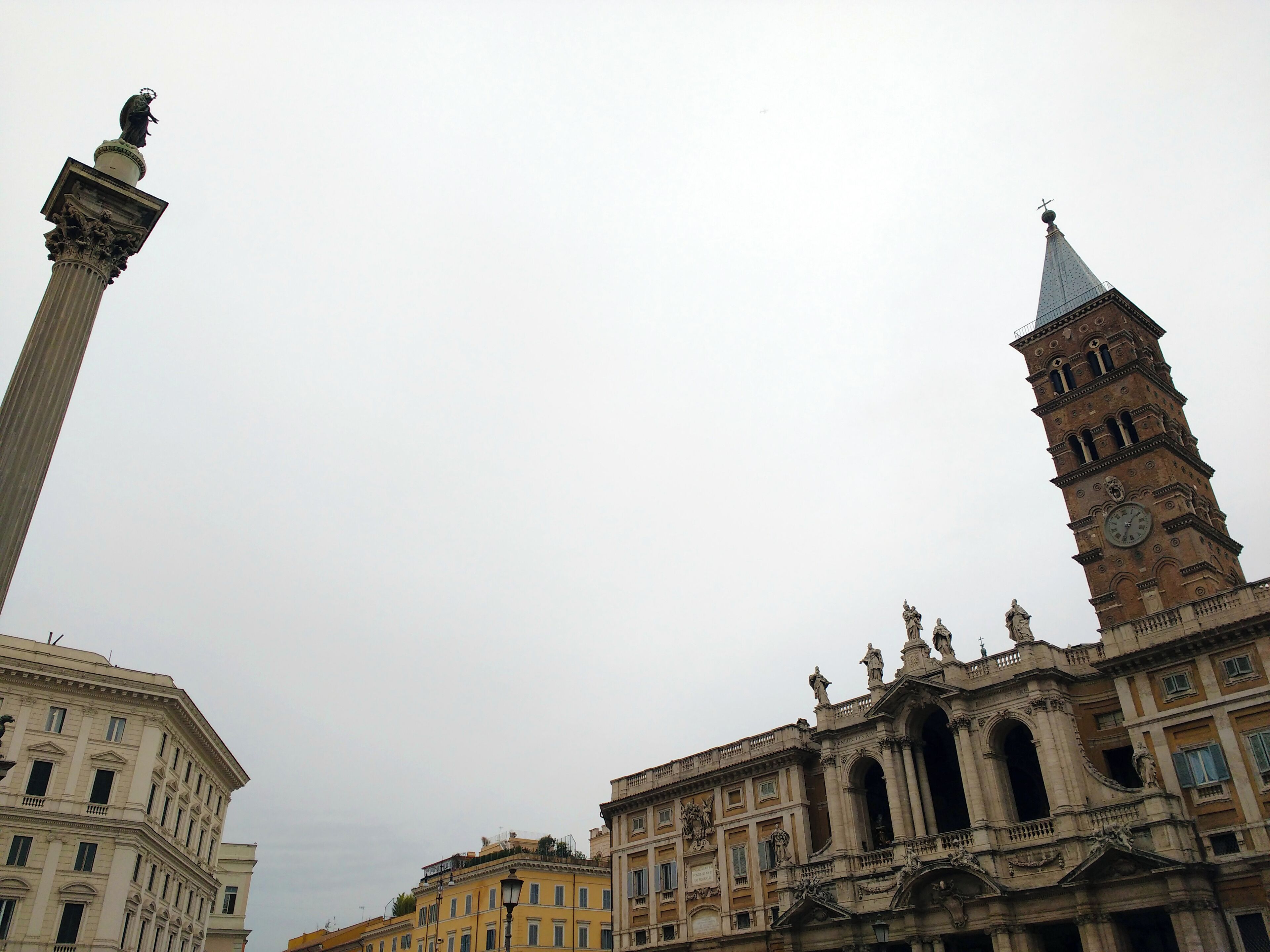 Altostratus opacus cloud cover the sky over Rome. Photo taked near Basilica di Santa maria Maggiore (on the right). On the left appear the Marian Column called "Column of the peace".