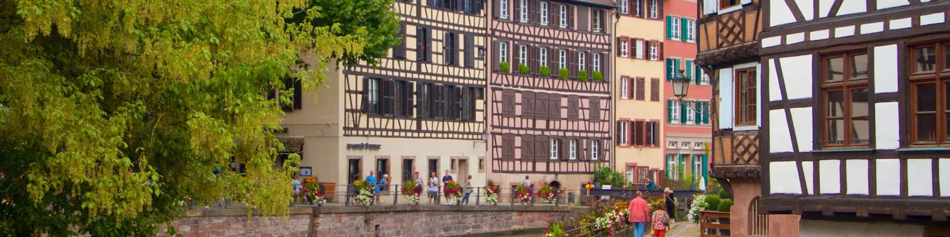 Petite France which includes a river or creek and a city