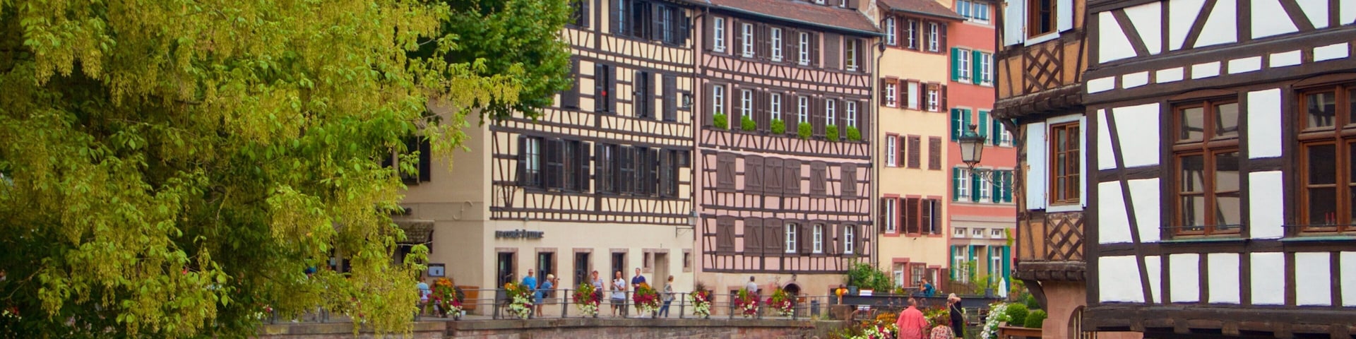 Petite France which includes a river or creek and a city