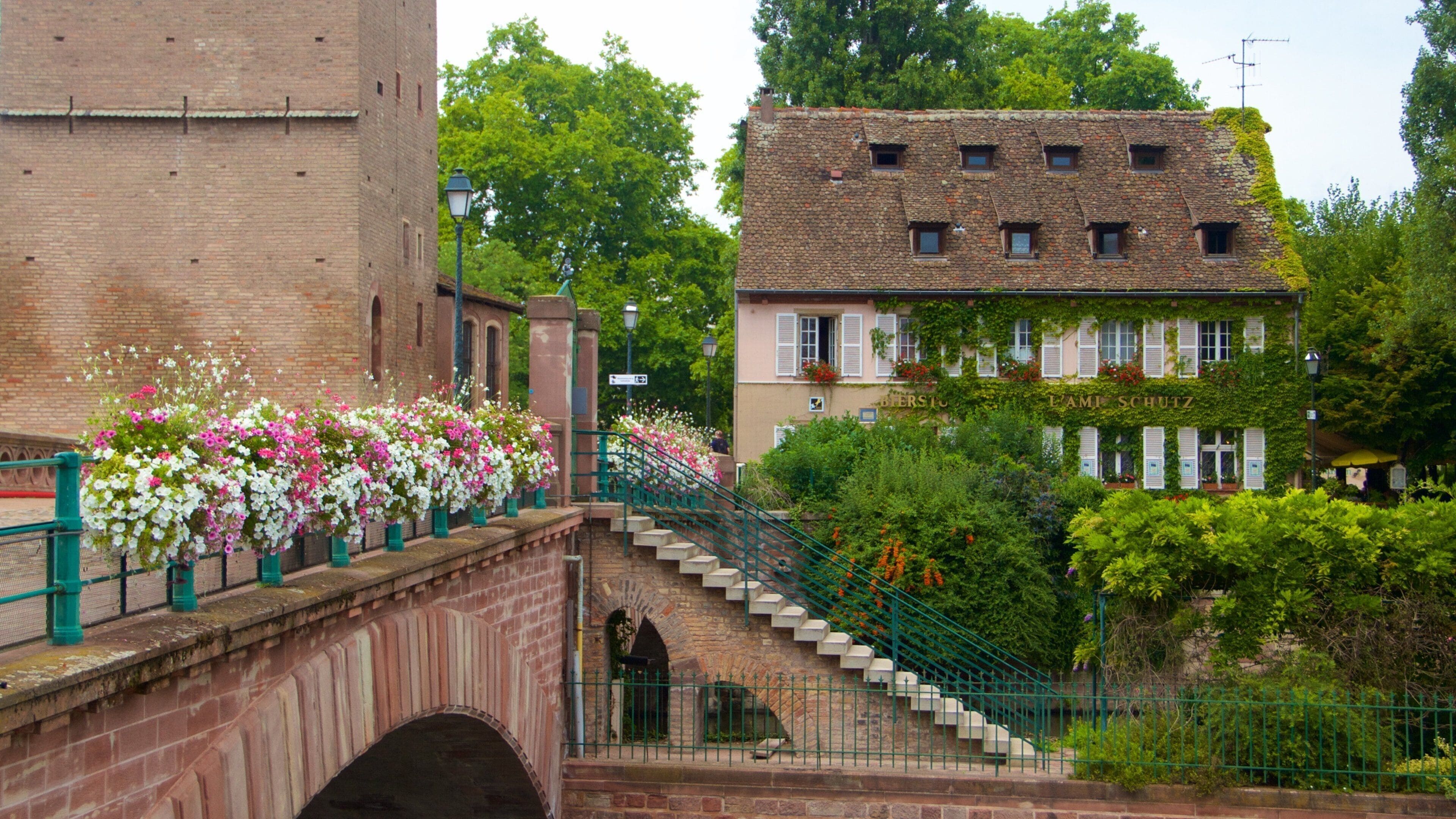 Petite France featuring heritage elements and flowers