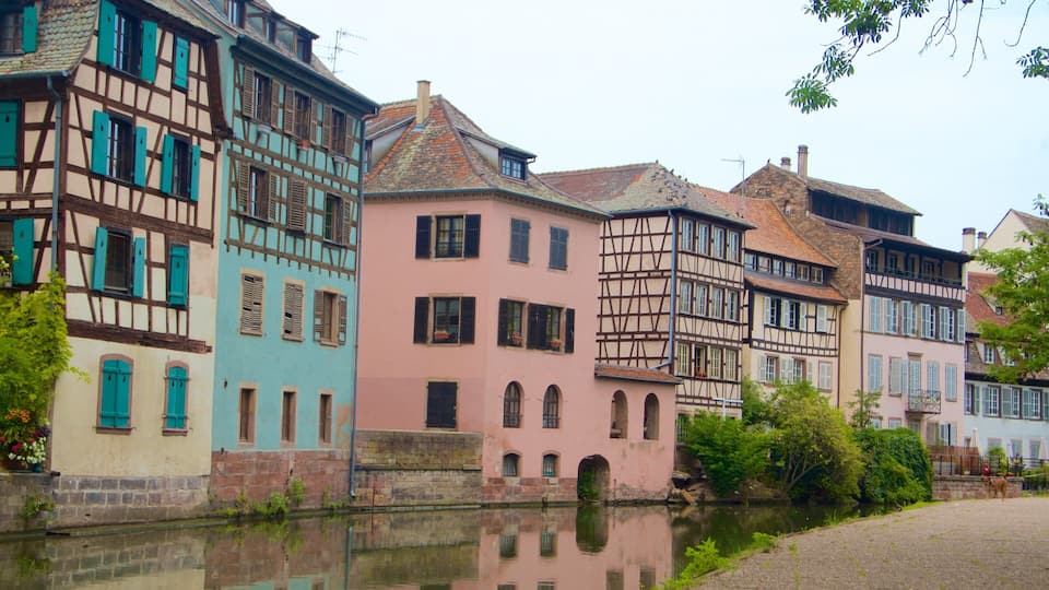 Petite France which includes a city and a river or creek