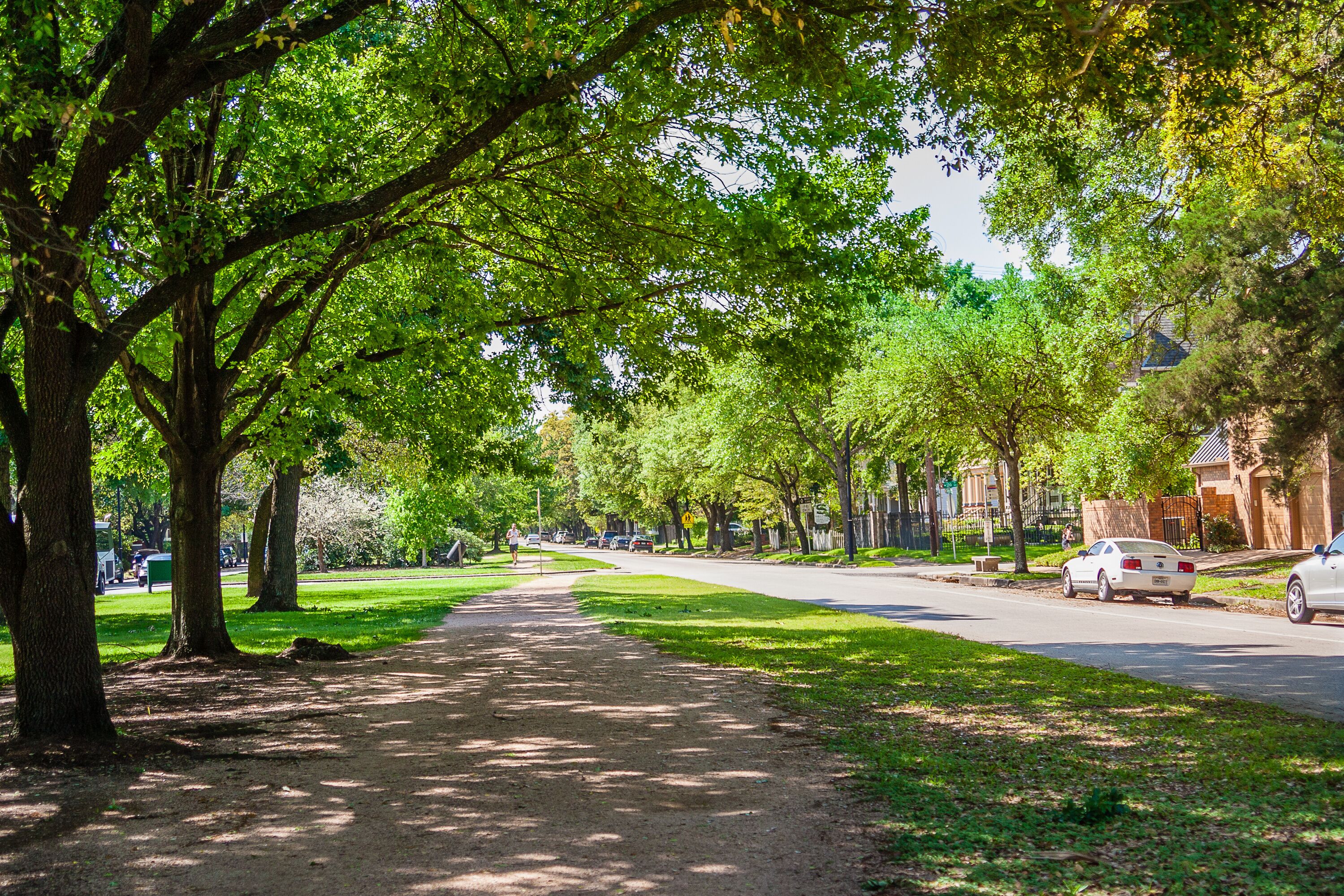 March, 2017, Houston, TX: A man jogs on the Paul Carr Jogging Trail in the Houston Heights