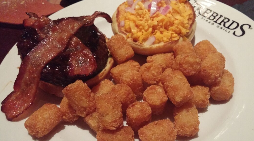 The Smokehouse Burger from Firebirds Wood Fired Grill in the Polaris area topped with java BBQ sauce, apple-wood smoked bacon, cheddar and red onion with a side of tots.
#delicious