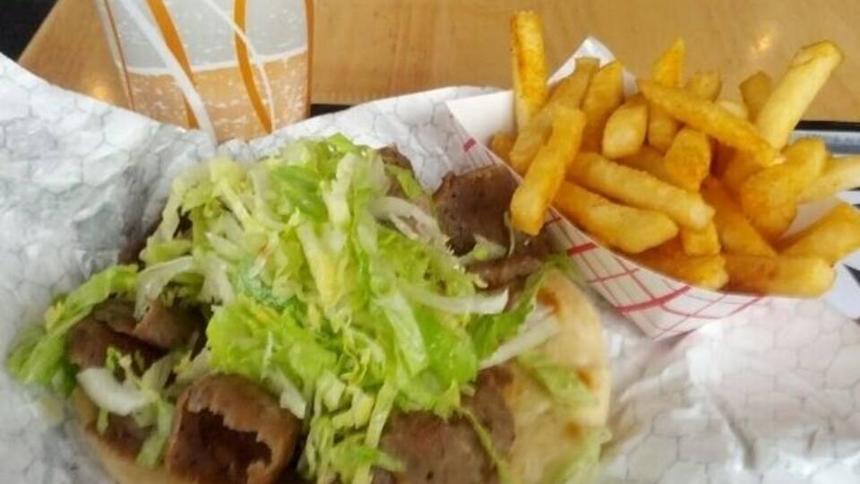 Jumbo gyro and fries combo.