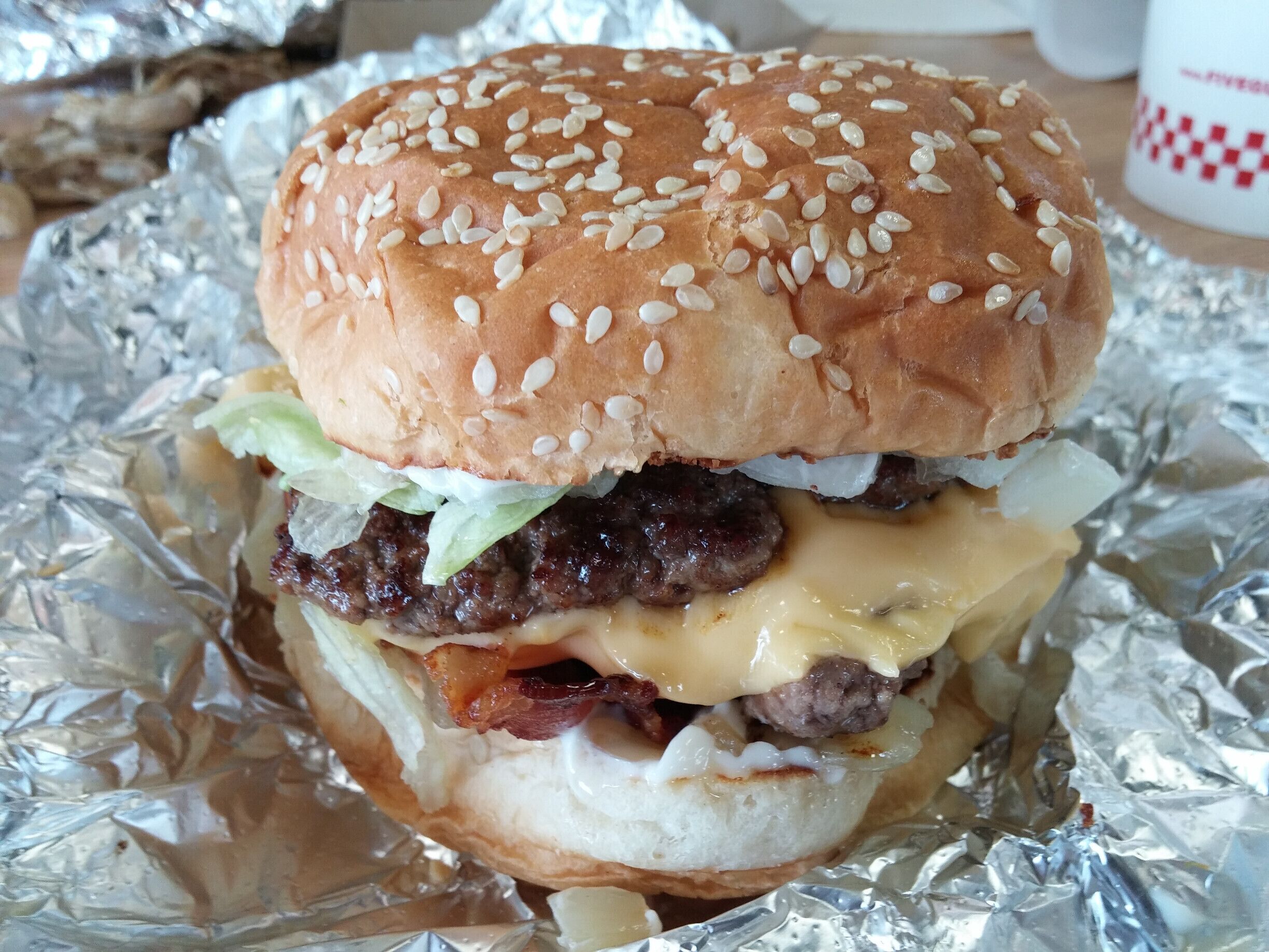 Bacon cheeseburger from Five Guys Burgers and Fries. While it's true this is a fast food/fast-casual chain, it should by no means be lumped in with the Burger Kings and McDonald's of the world. A damn tasty burger with plenty of topping choices for customization. 