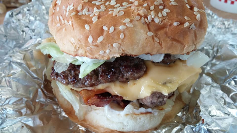 Bacon cheeseburger from Five Guys Burgers and Fries. While it's true this is a fast food/fast-casual chain, it should by no means be lumped in with the Burger Kings and McDonald's of the world. A damn tasty burger with plenty of topping choices for customization.