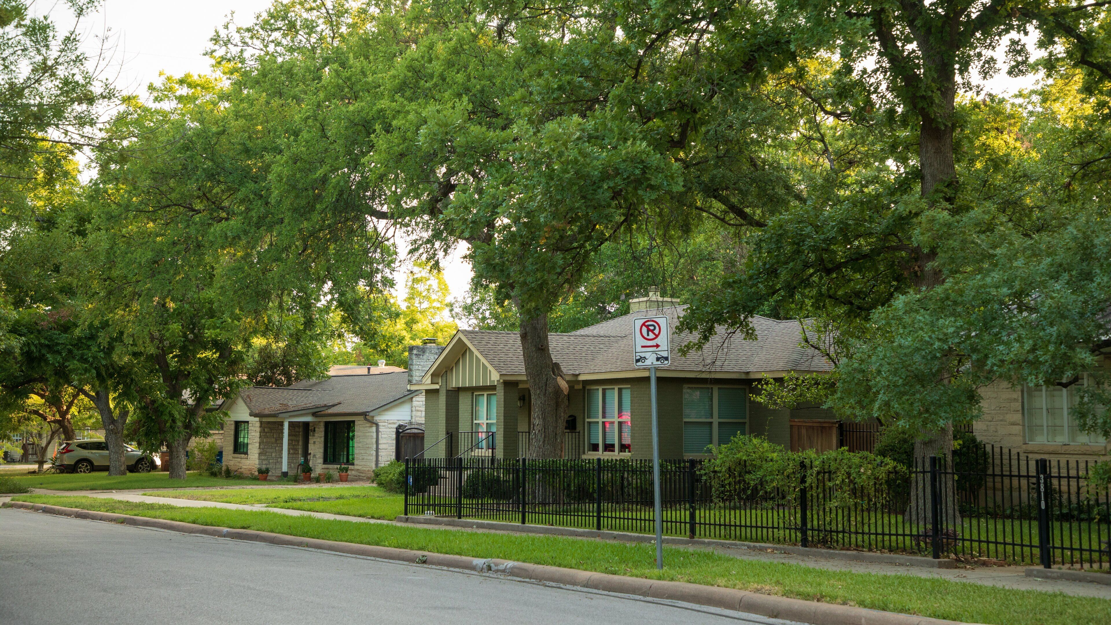 Central Austin which includes a house and a small town or village