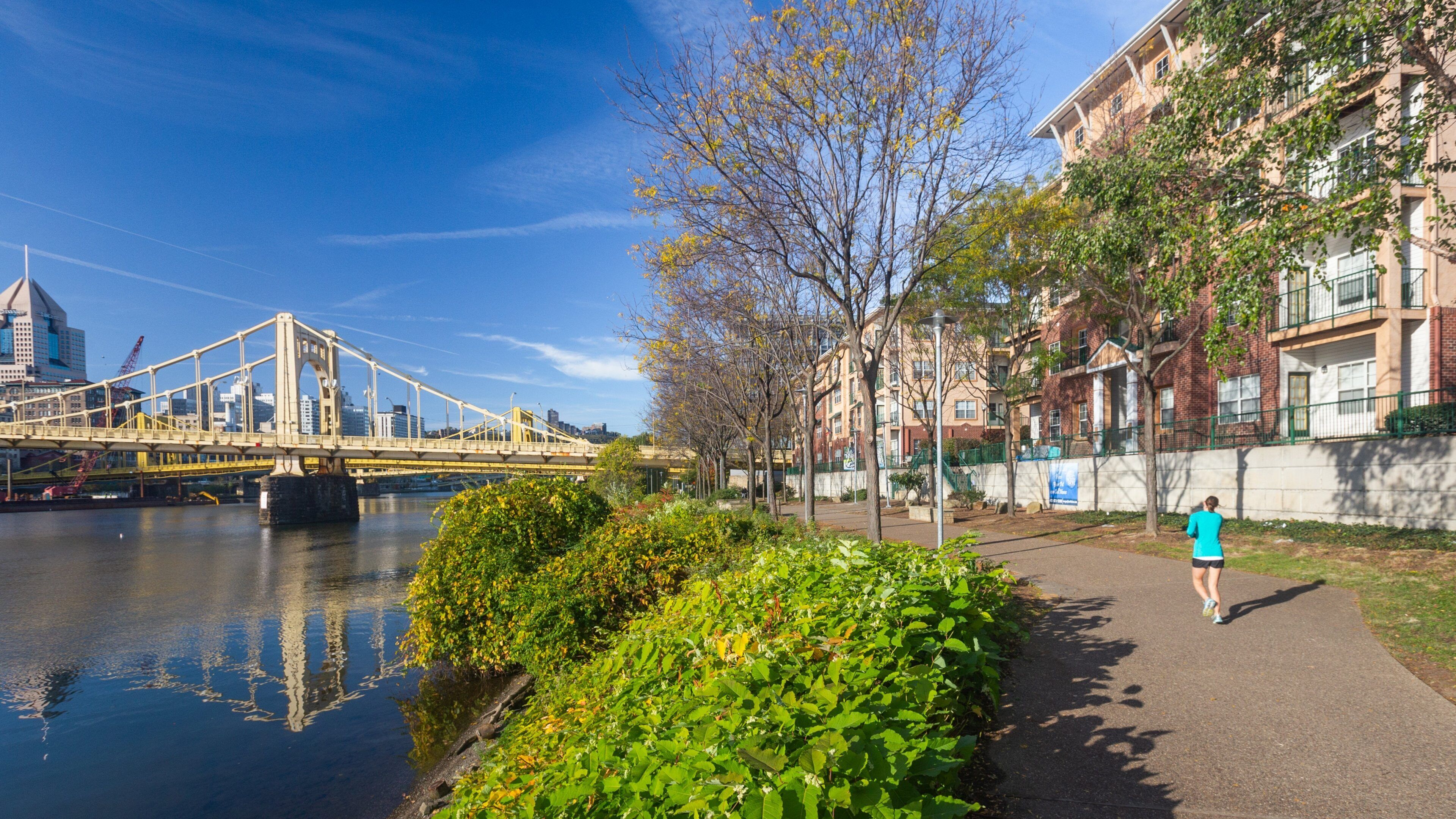 North Shore featuring a bridge and a river or creek