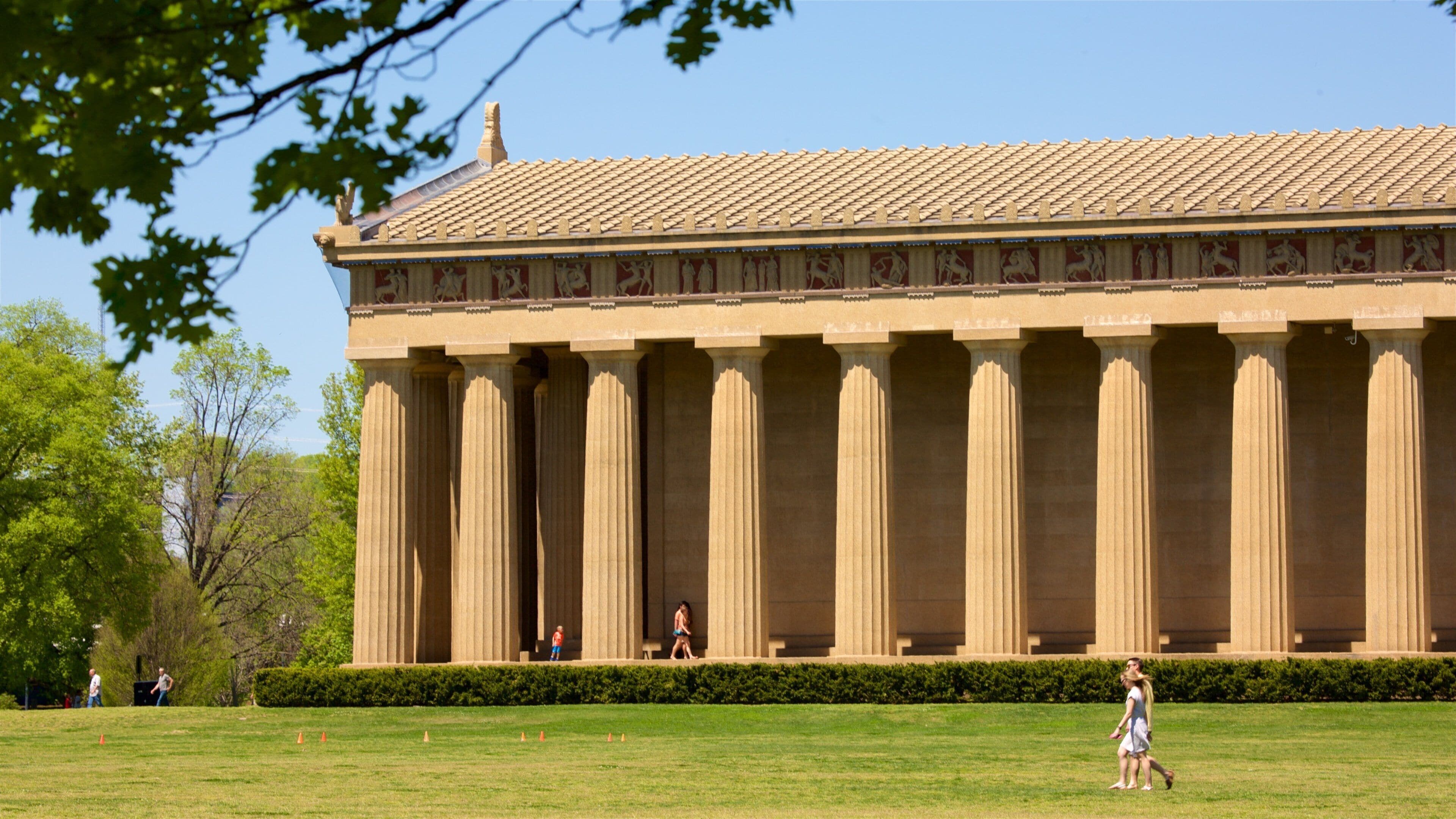 West End showing heritage architecture and an administrative buidling as well as a couple