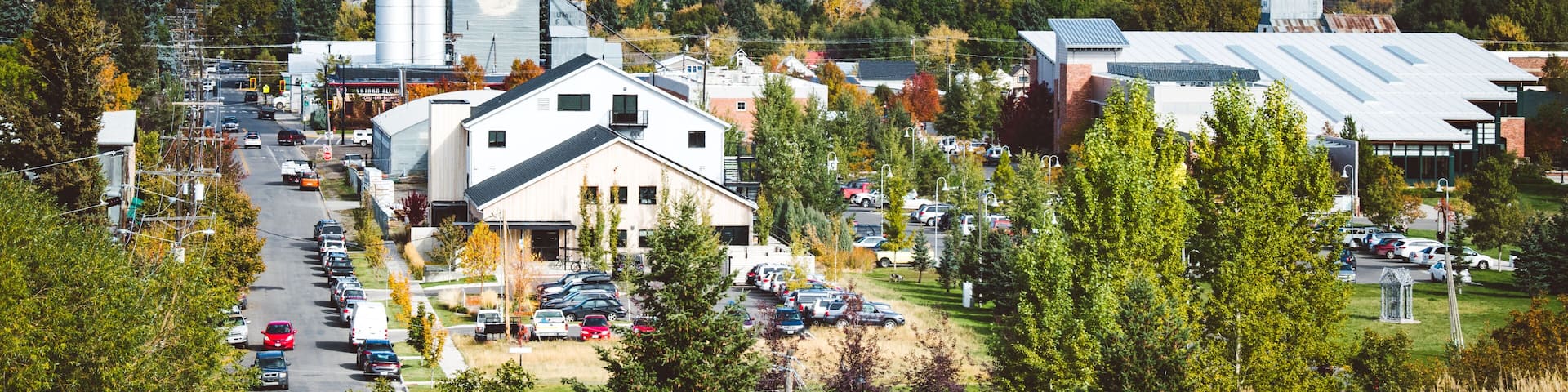 Downtown Bozeman, Montana seen from afar with mountains in the background