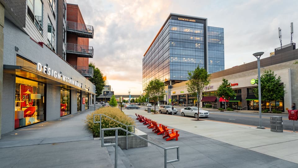 The Gulch showing a sunset, street scenes and a city