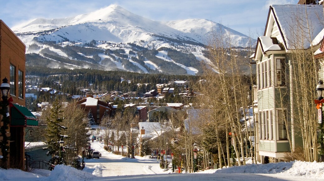 Looking down a street in the ski town of Breckenridge Colorado in winter with Peak 8 in the background in Summit County