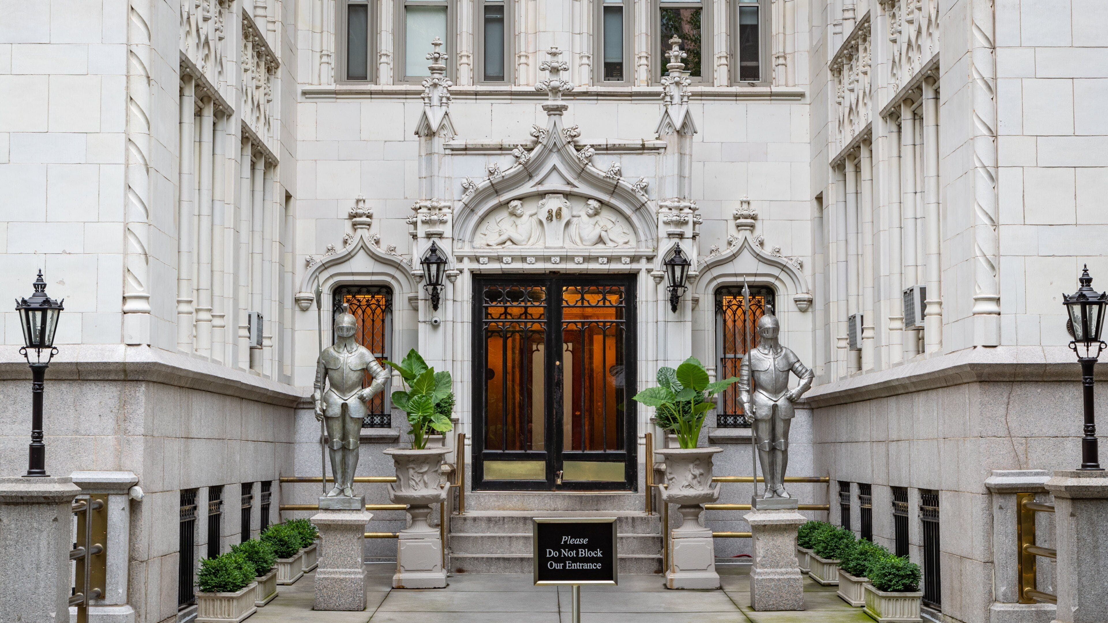 Gramercy which includes a statue or sculpture, heritage elements and signage