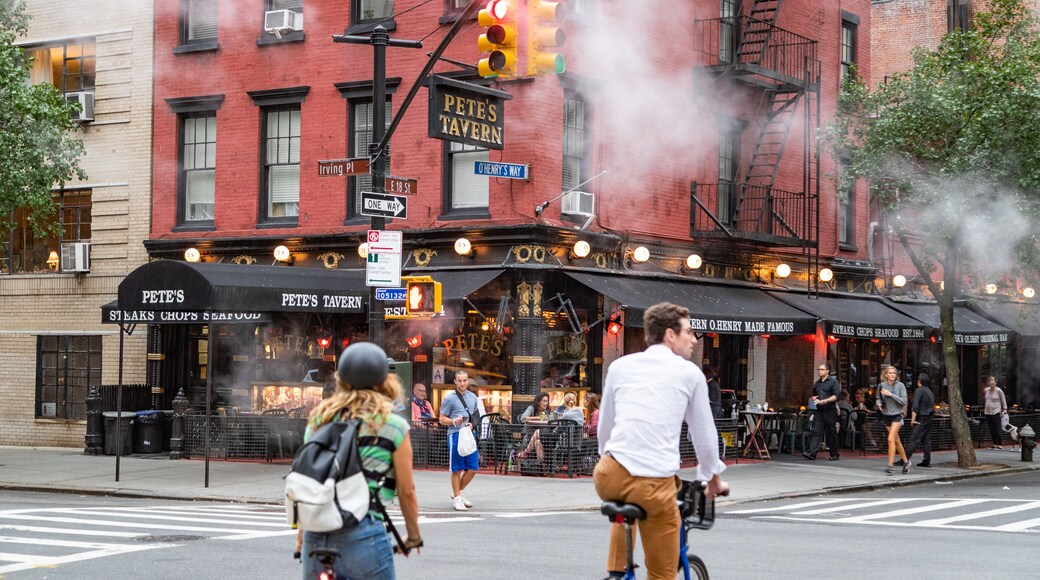 Gramercy which includes a city, road cycling and street scenes