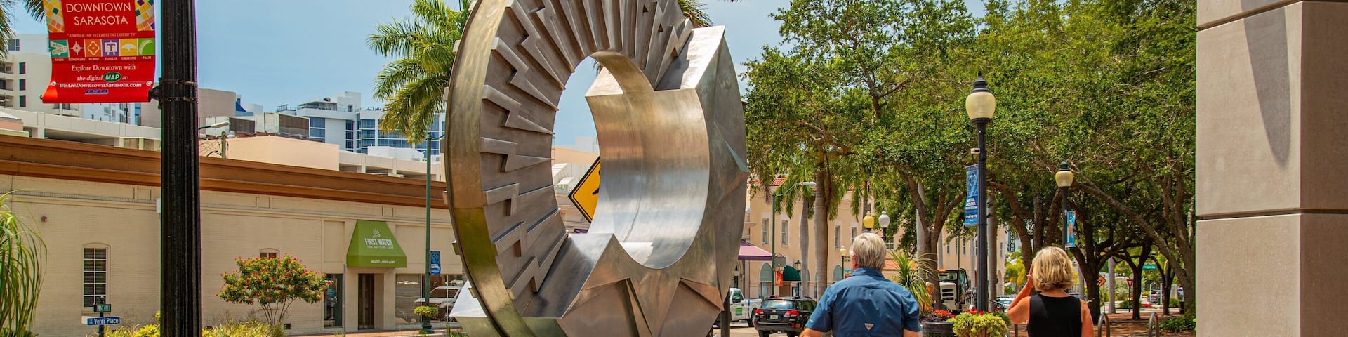 Central Sarasota showing outdoor art and street scenes as well as a couple