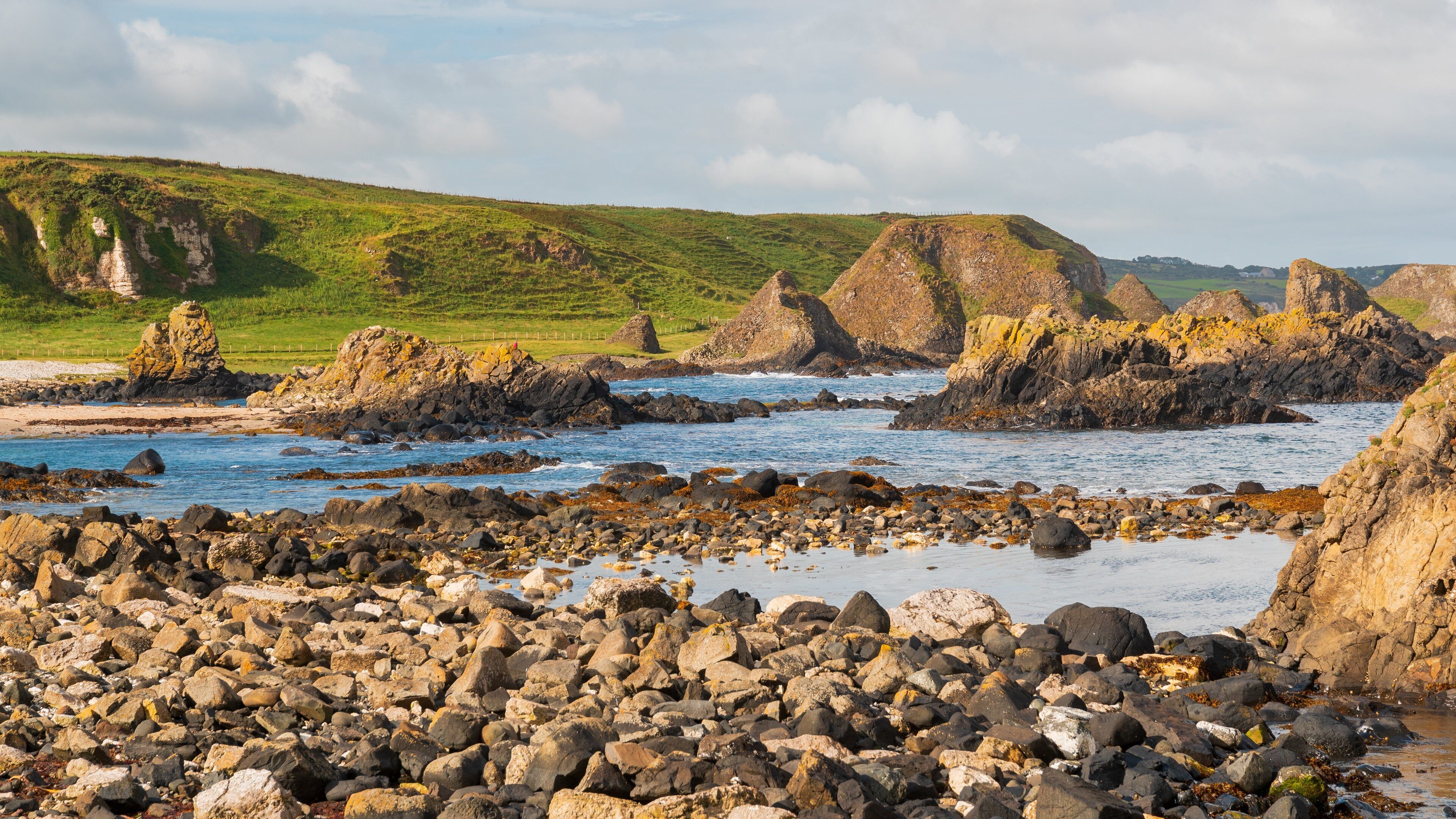 Ballycastle featuring rocky coastline and general coastal views