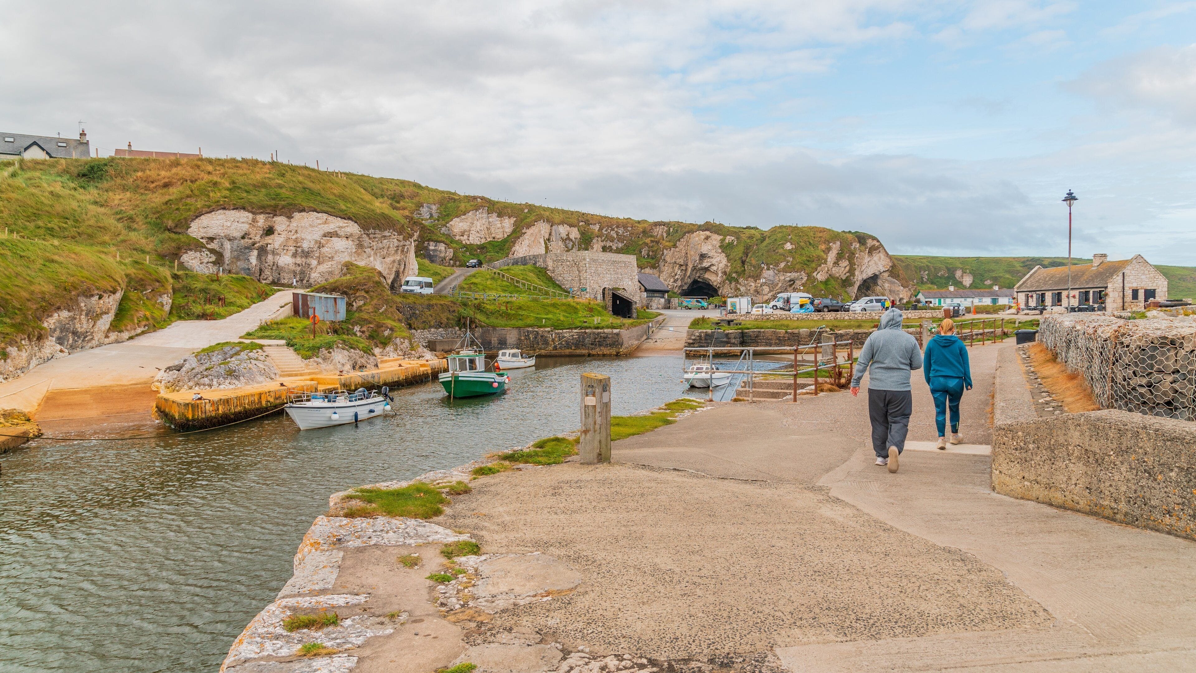 Ballycastle showing a river or creek as well as a couple