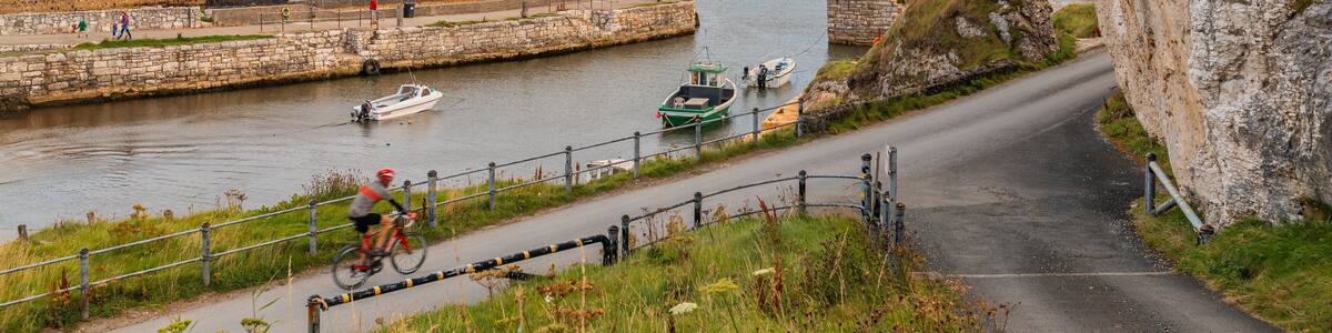 Ballycastle showing a river or creek and boating