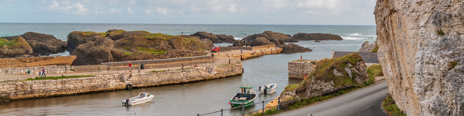 Ballycastle showing a river or creek and boating