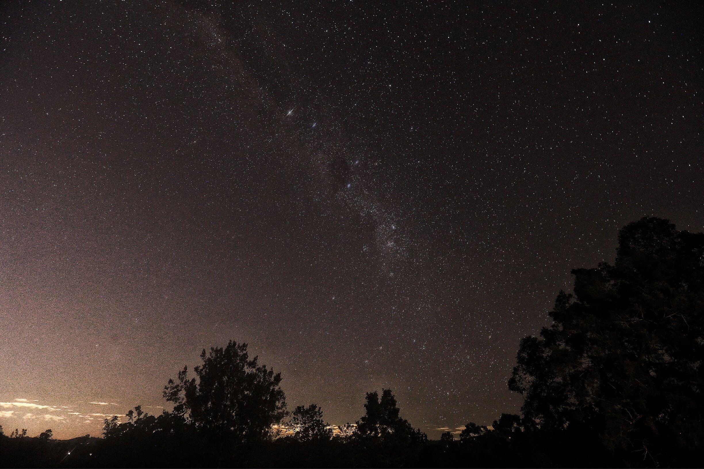 A starry night sky with visible stars and the Milky Way.