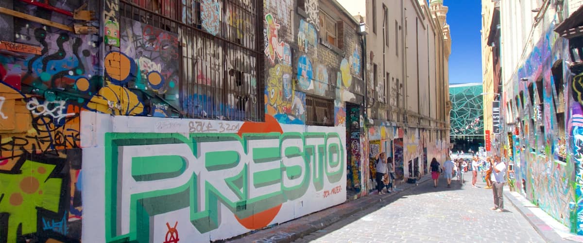 Melbourne showing street scenes and outdoor art as well as a small group of people