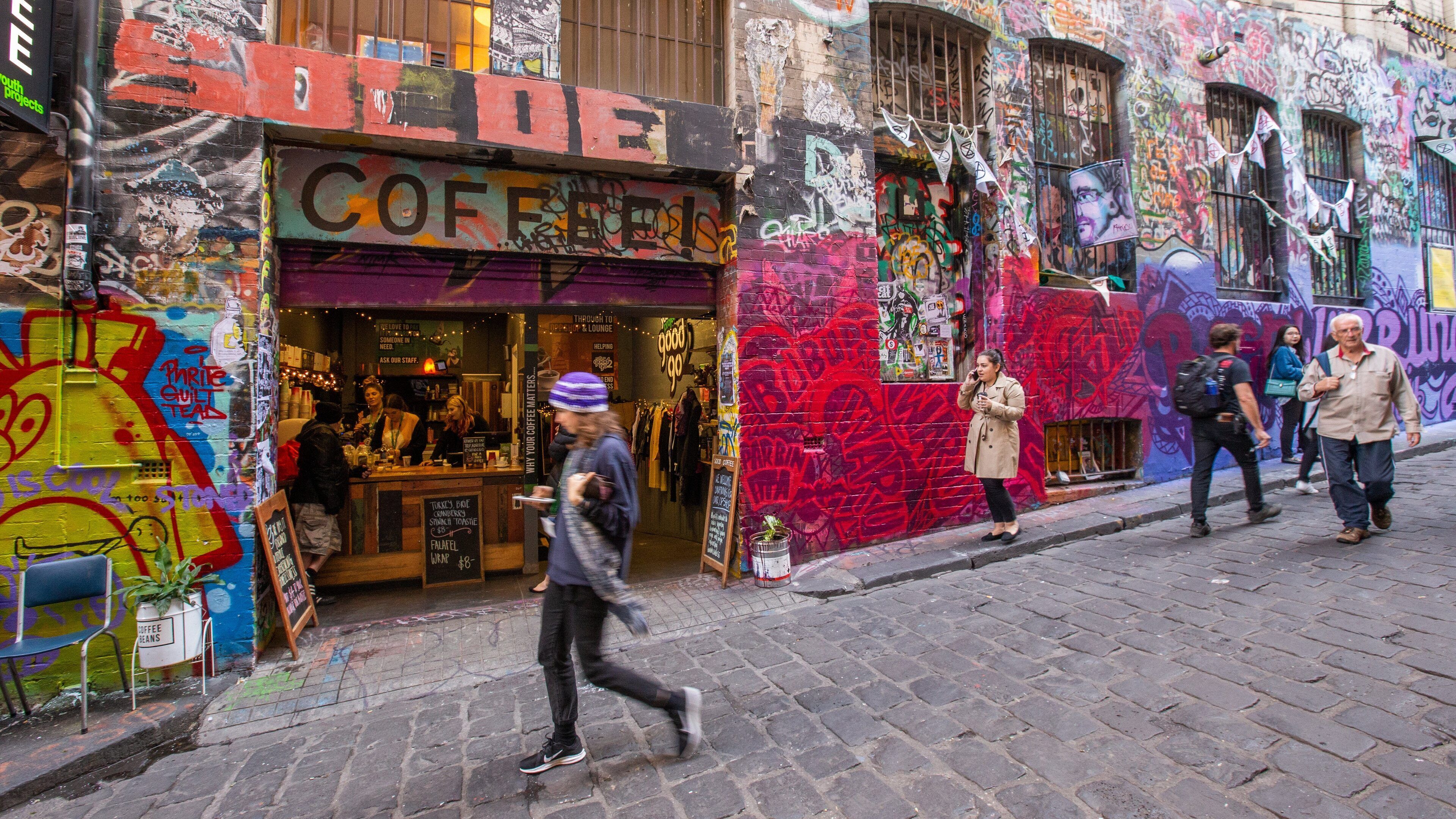 Hosier Lane which includes outdoor art and street scenes